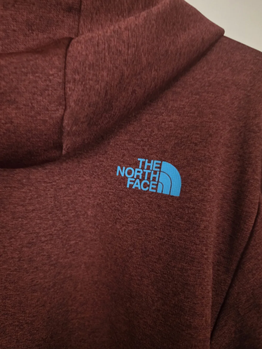 The North Face Maroon Hoodie with Bright Blue Accents